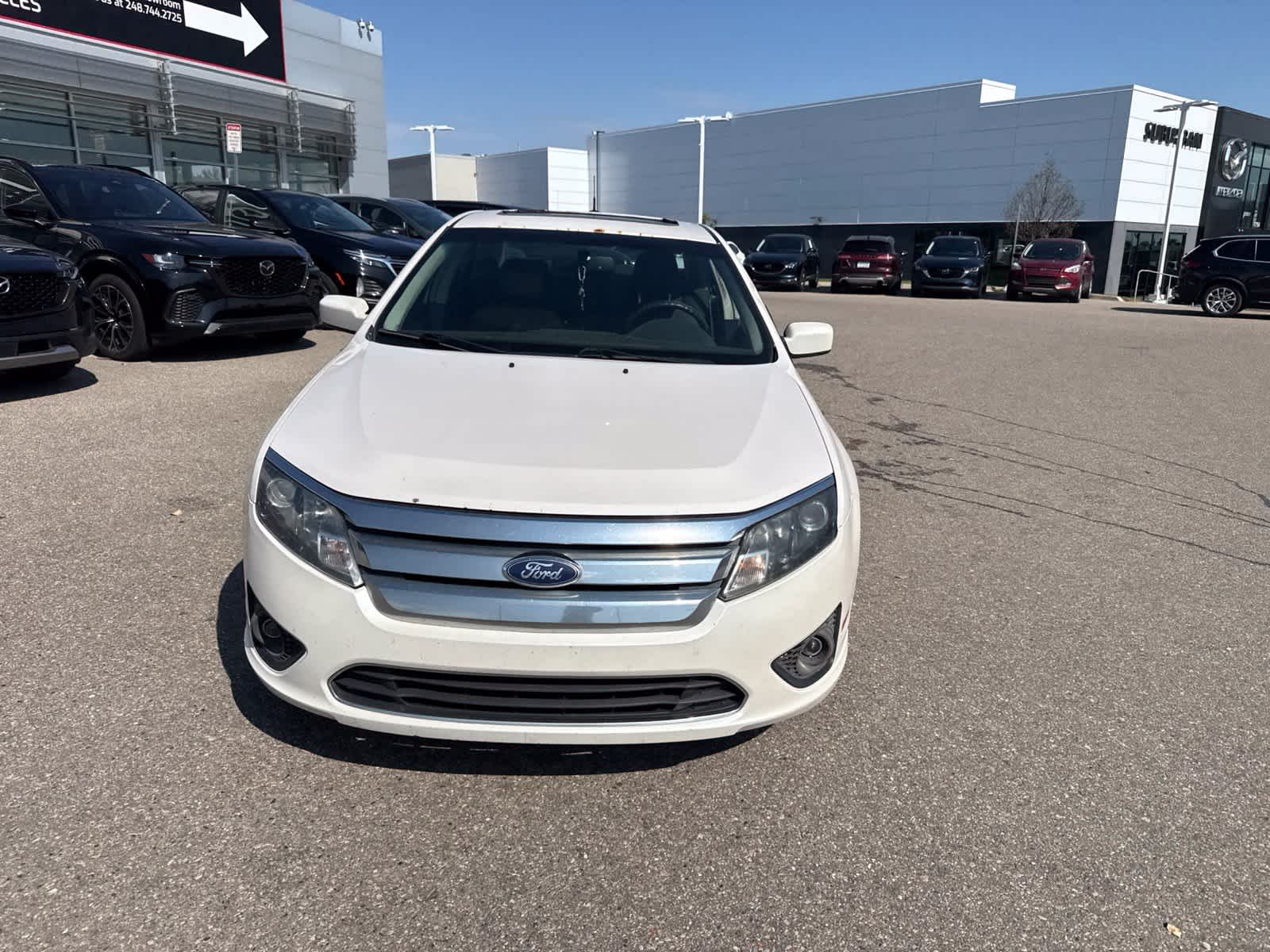 Used 2010 Ford Fusion SE with VIN 3FAHP0HA3AR349978 for sale in Troy, MI