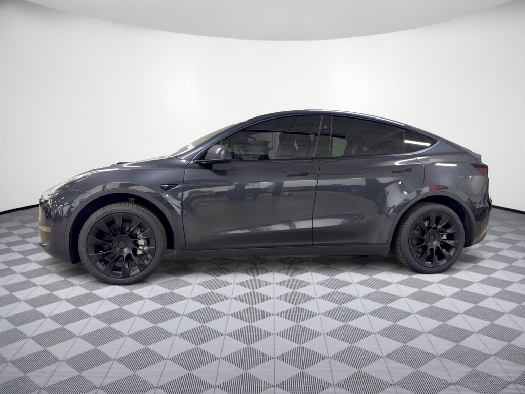 Used 2024 Tesla Model Y Long Range with VIN 7SAYGDED3RF056694 for sale in Orlando, FL