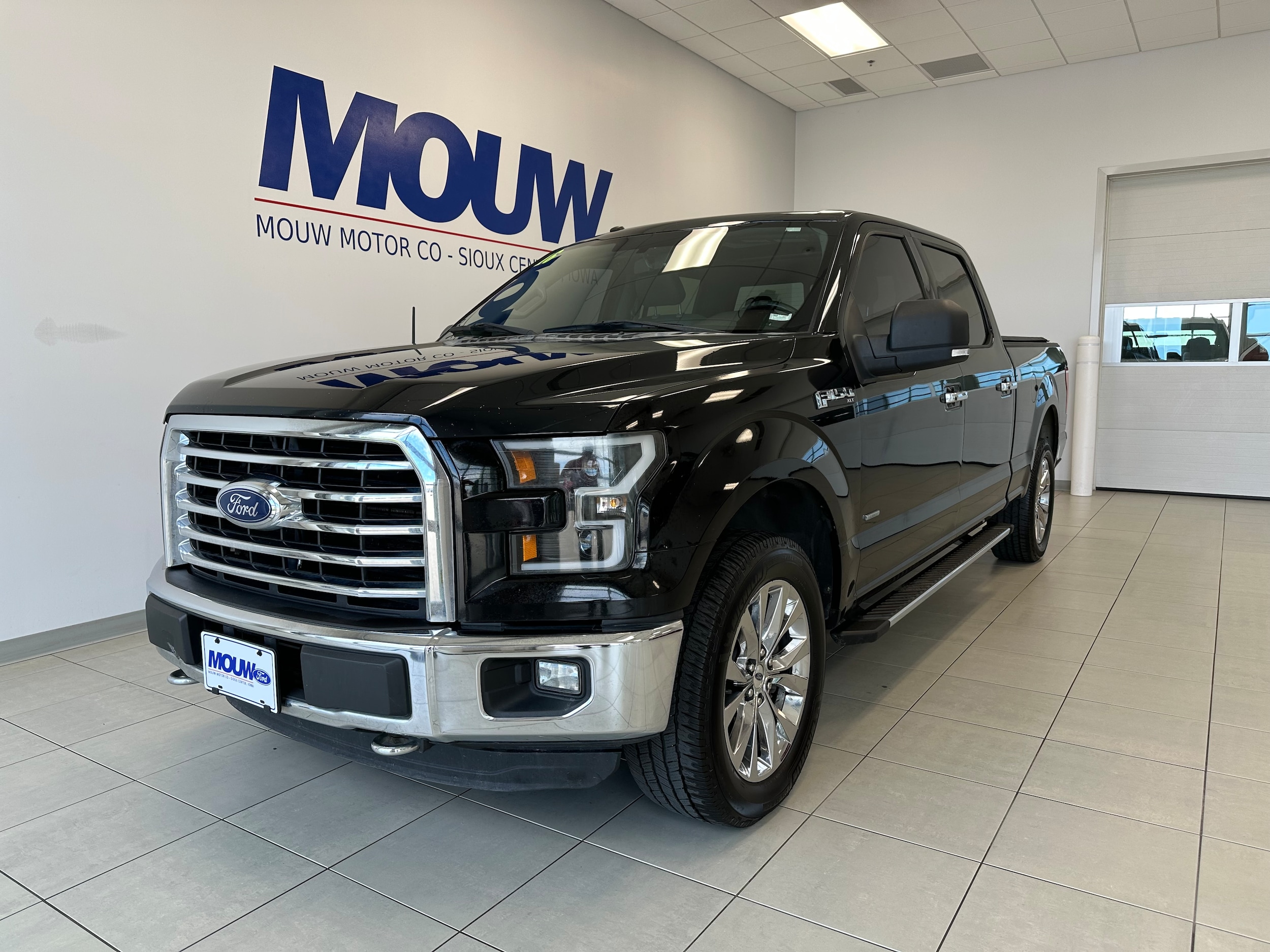 Used 2016 Ford F-150 XLT with VIN 1FTFW1EG2GKD54833 for sale in Sioux Center, IA