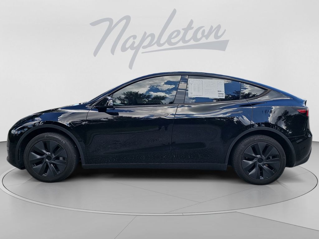 Used 2025 Tesla Model Y Long Range with VIN 7SAYGDED3SA377217 for sale in Orlando, FL