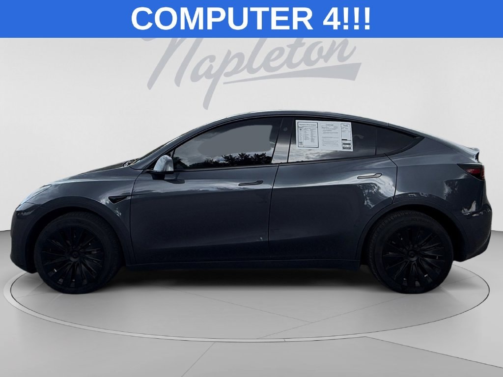 Used 2023 Tesla Model Y Long Range with VIN 7SAYGDEE9PF851156 for sale in Orlando, FL