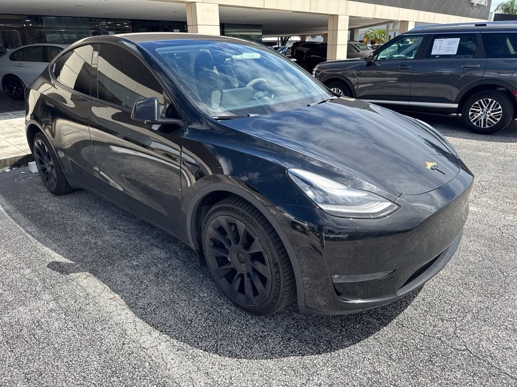 Used 2022 Tesla Model Y Long Range with VIN 7SAYGDEE4NF480467 for sale in Lake Park, FL