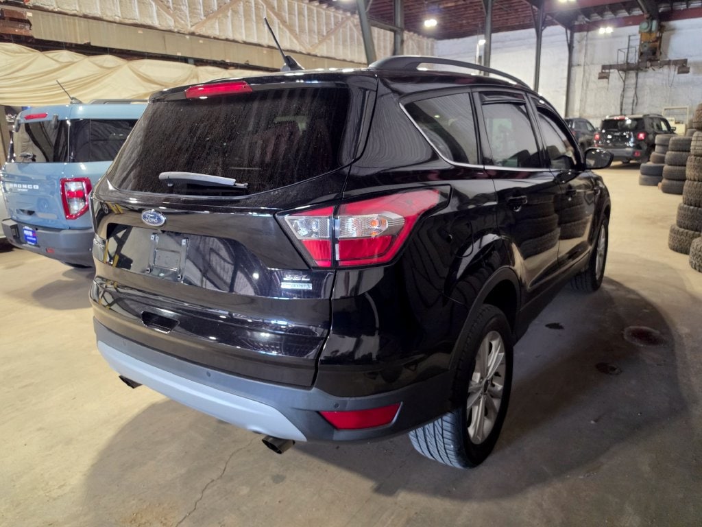 Used 2018 Ford Escape SEL with VIN 1FMCU0HDXJUA83063 for sale in Chillicothe, OH
