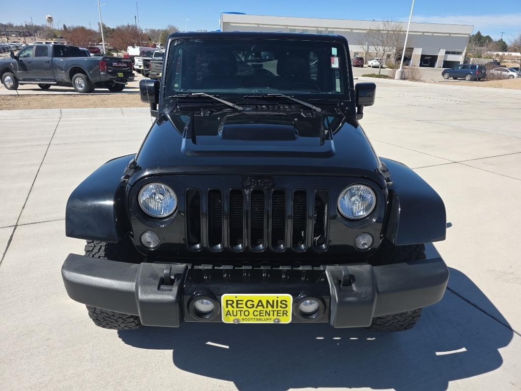 Used 2015 Jeep Wrangler Unlimited Altitude with VIN 1C4BJWEGXFL718841 for sale in Scottsbluff, NE