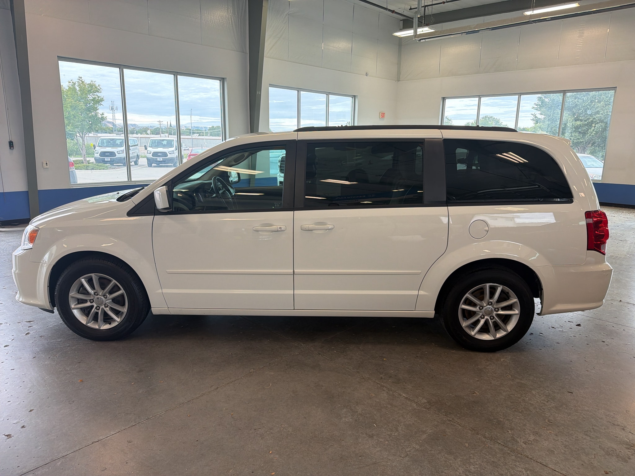 Used 2013 Dodge Grand Caravan SXT with VIN 2C4RDGCG5DR692944 for sale in Scottsbluff, NE