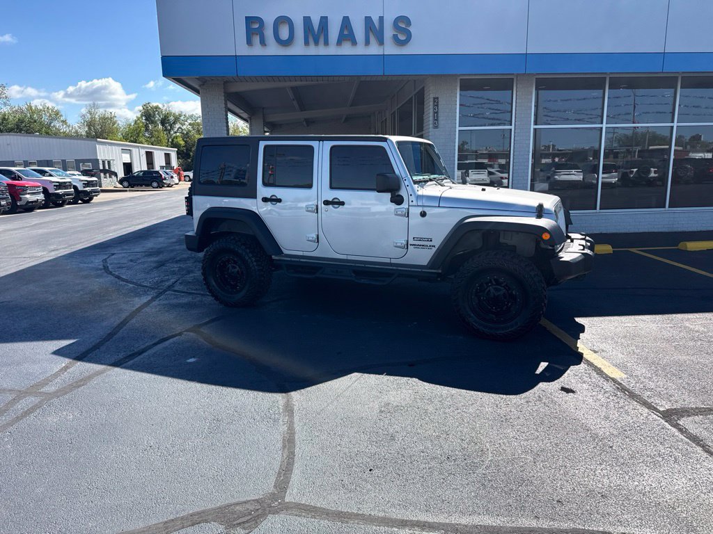 Used 2012 Jeep Wrangler Unlimited Sport with VIN 1C4BJWDG3CL244647 for sale in Independence, KS
