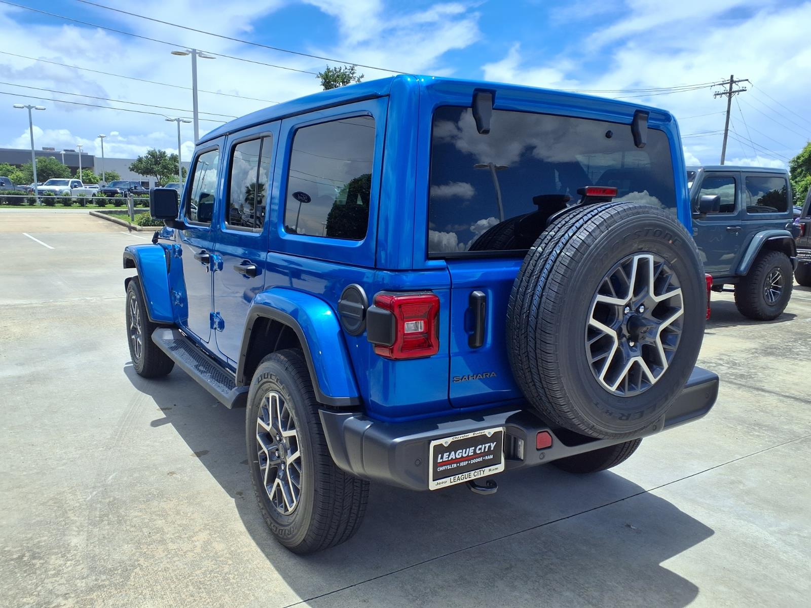 New 2026 Jeep Wrangler 4-Door Sahara Sport Utility