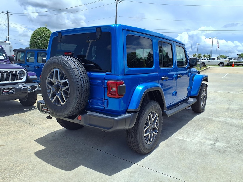 New 2026 Jeep Wrangler 4-Door Sahara Sport Utility