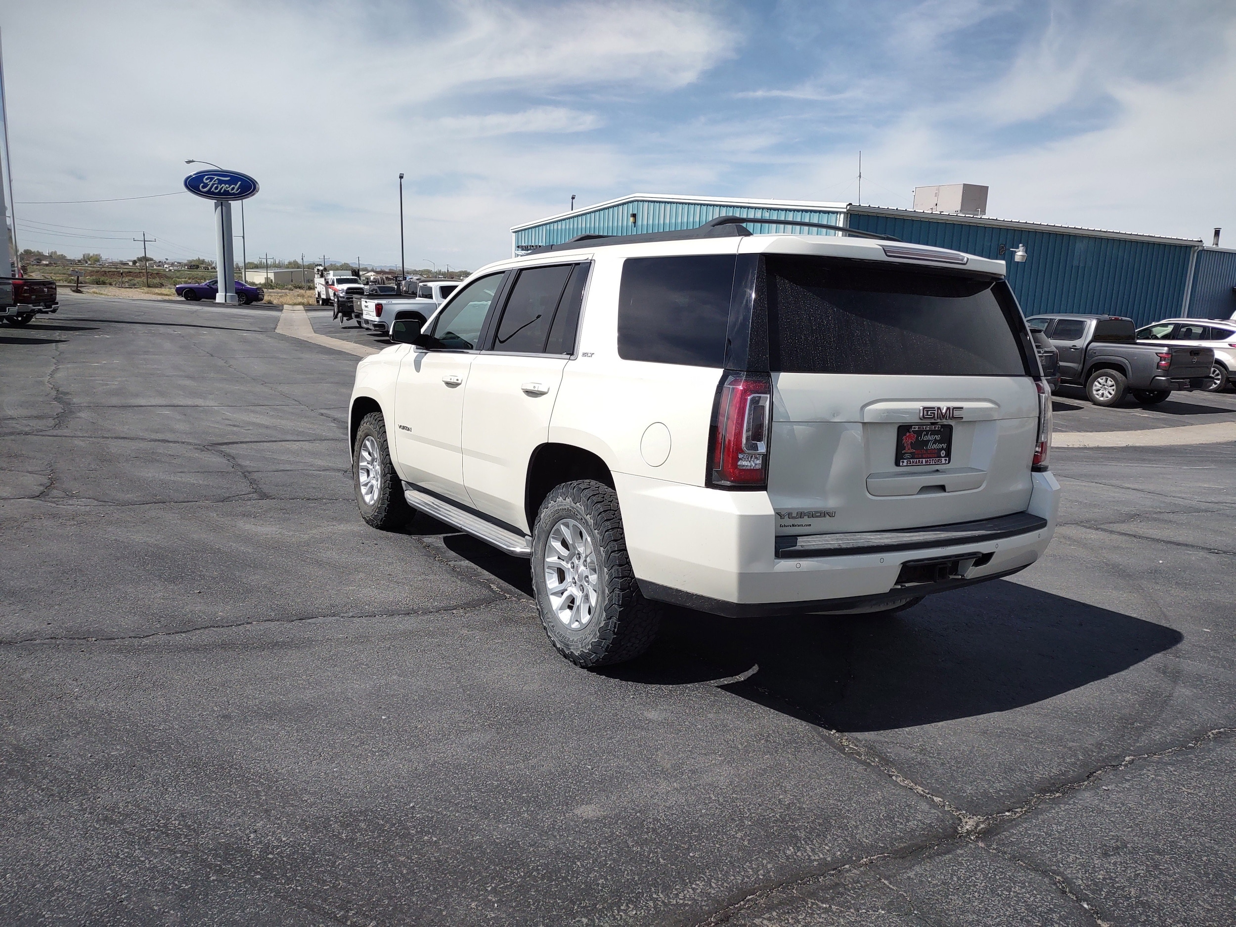 Used 2015 GMC Yukon SLT with VIN 1GKS2BKC3FR597465 for sale in Delta, UT