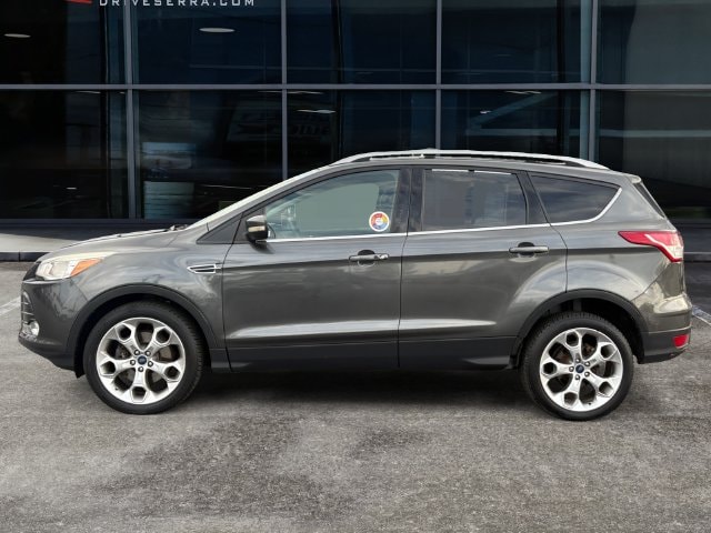 Used 2015 Ford Escape Titanium with VIN 1FMCU0J98FUB11956 for sale in Washington, MI