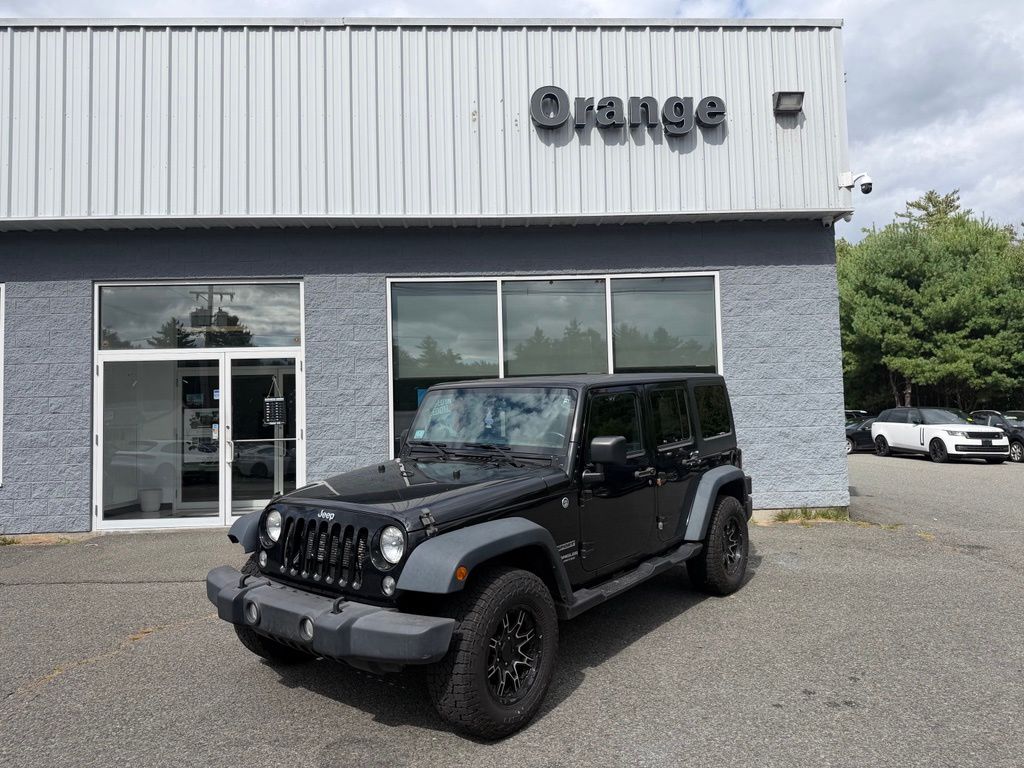 Used 2015 Jeep Wrangler Unlimited Sport with VIN 1C4BJWDG4FL652563 for sale in Orange, MA