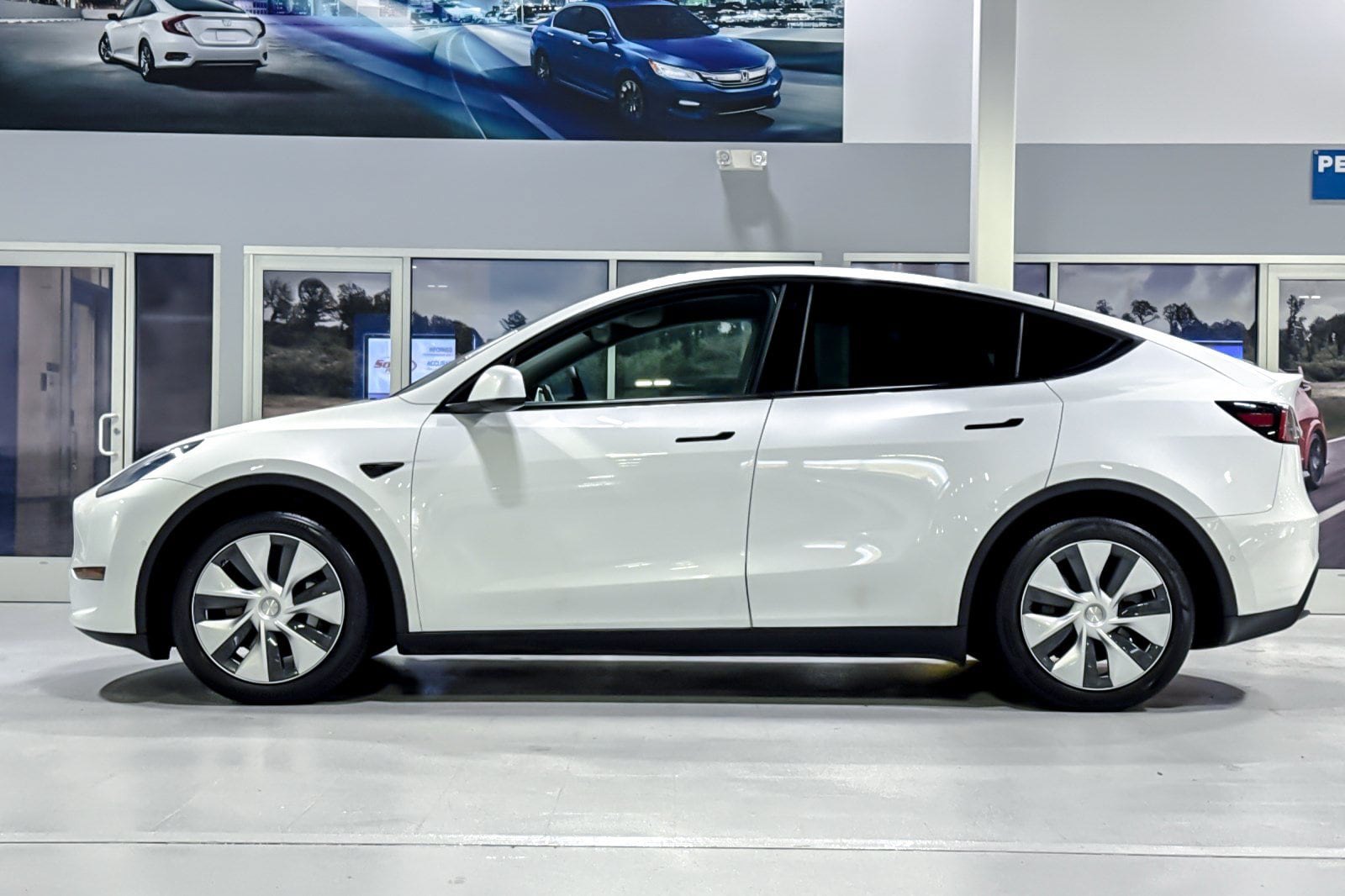 Used 2021 Tesla Model Y Long Range with VIN 5YJYGDEE0MF263283 for sale in Concord, CA
