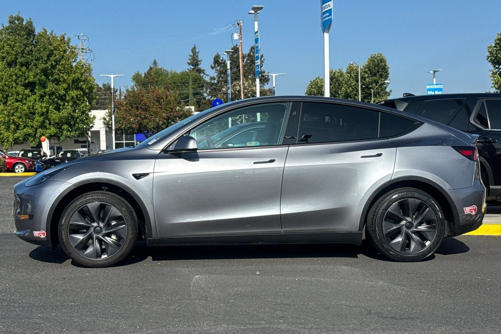 Used 2024 Tesla Model Y Long Range with VIN 7SAYGDED4RF126686 for sale in San Jose, CA