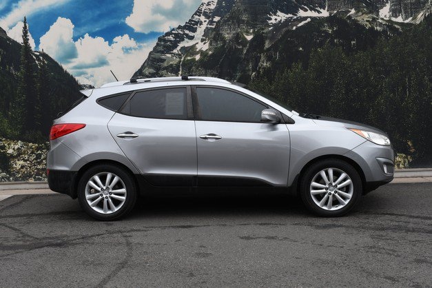Used 2013 Hyundai Tucson Limited with VIN KM8JUCAC6DU579024 for sale in Denver, CO