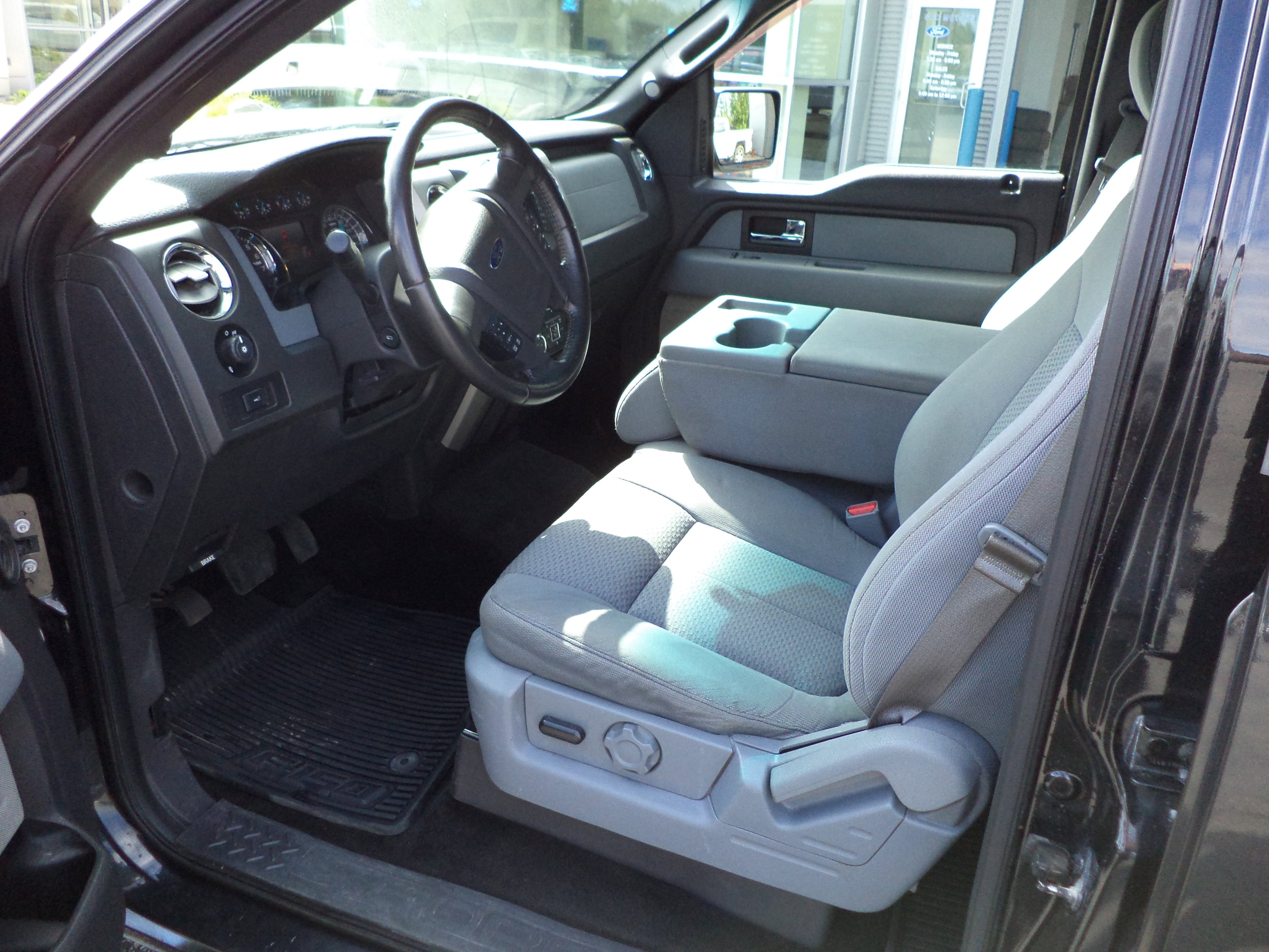 Used 2014 Ford F-150 XLT with VIN 1FTFW1ETXEFB11659 for sale in Sault Ste. Marie, MI