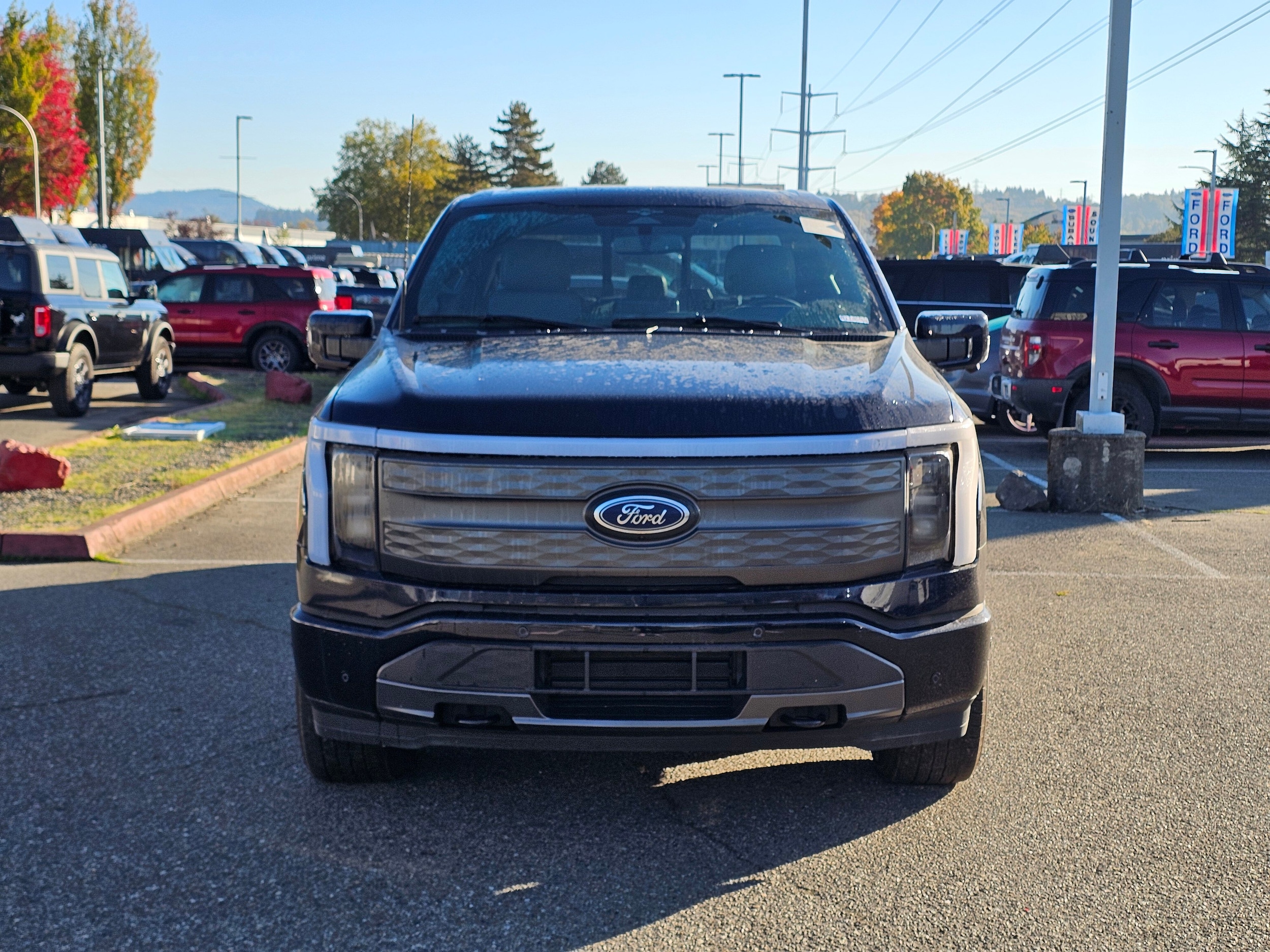 Used 2023 Ford F-150 Lightning Lariat with VIN 1FT6W1EVXPWG11891 for sale in Renton, WA