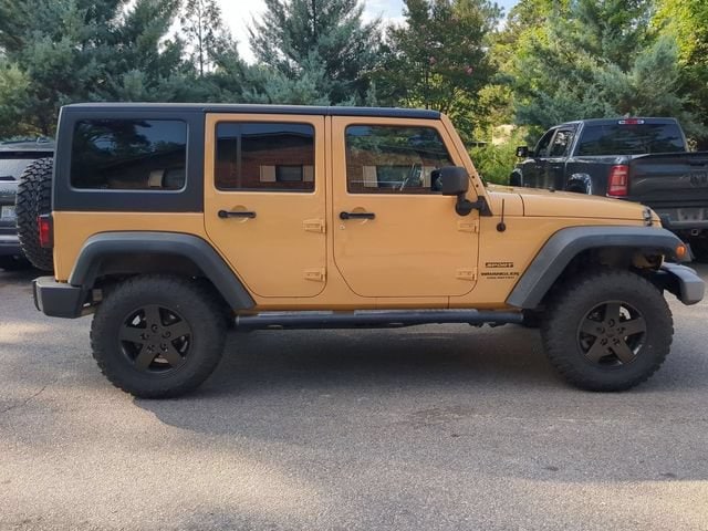 Used 2013 Jeep Wrangler Unlimited Sport with VIN 1C4BJWDG7DL674652 for sale in Southern Pines, NC
