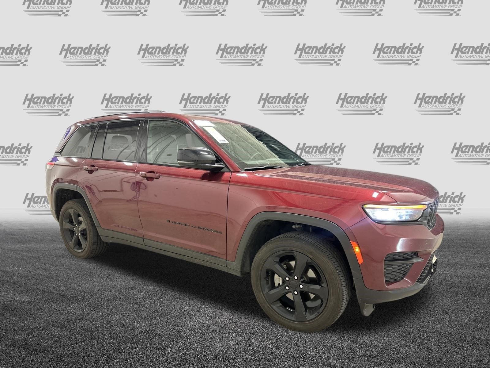 Used 2025 Jeep Grand Cherokee Altitude with VIN 1C4RJHAG1SC302204 for sale in Kansas City