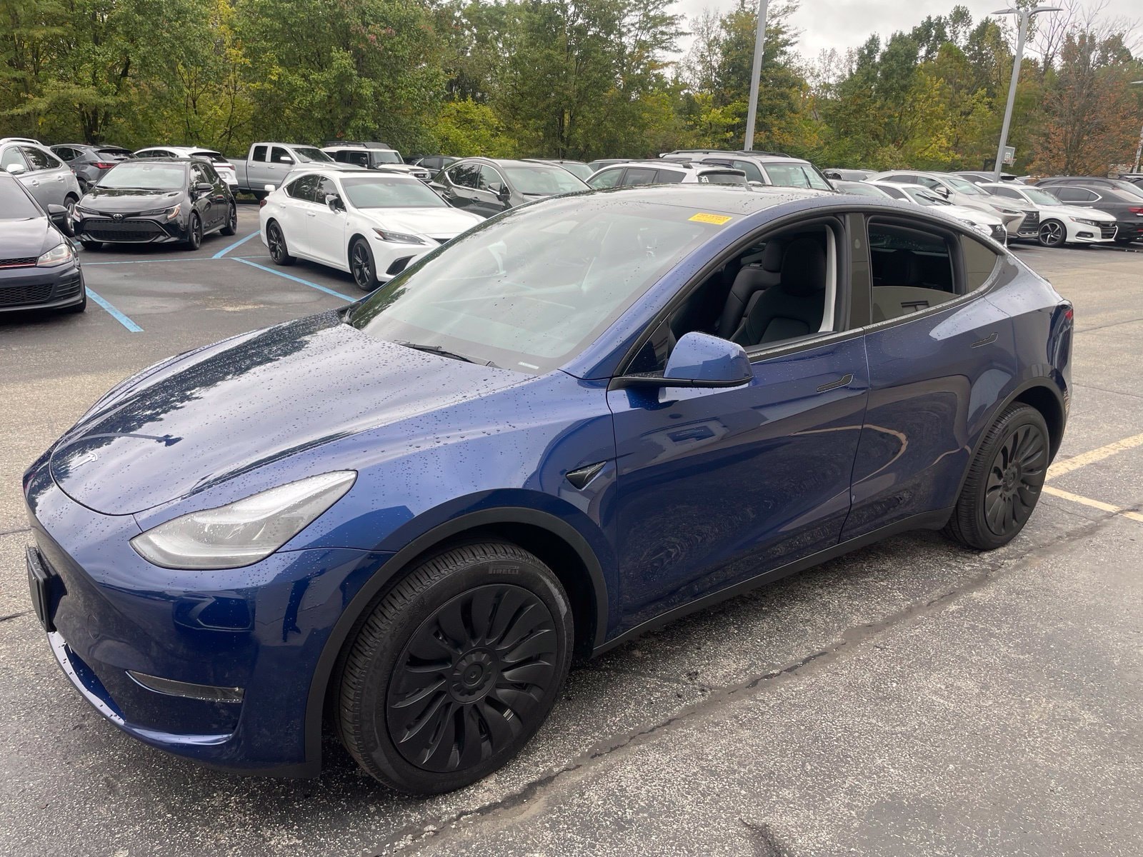 Used 2024 Tesla Model Y Long Range with VIN 7SAYGDEE5RA235549 for sale in Indianapolis, IN