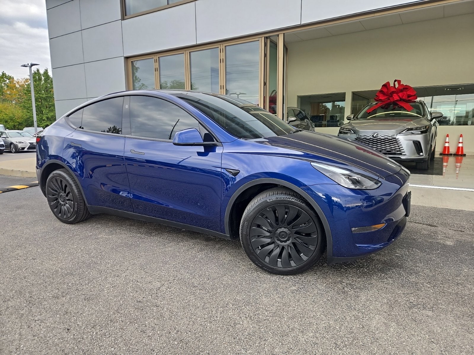 Used 2024 Tesla Model Y Long Range with VIN 7SAYGDEE5RA235549 for sale in Indianapolis, IN