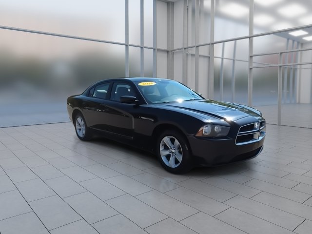 Used 2014 Dodge Charger SE with VIN 2C3CDXBGXEH287021 for sale in Highland Township, MI