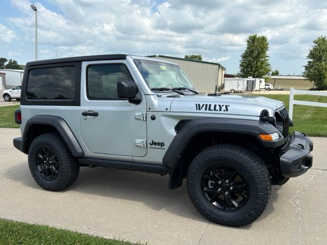Used 2023 Jeep Wrangler 2-Door Willys Sport with VIN 1C4HJXAG8PW549909 for sale in Kansas City