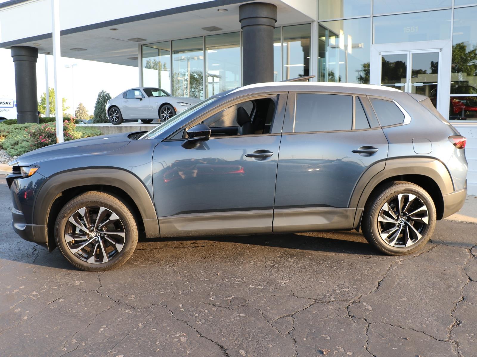 Certified 2026 Mazda CX-50 Premium Plus with VIN 7MMVAAEW6TN154516 for sale in Kansas City