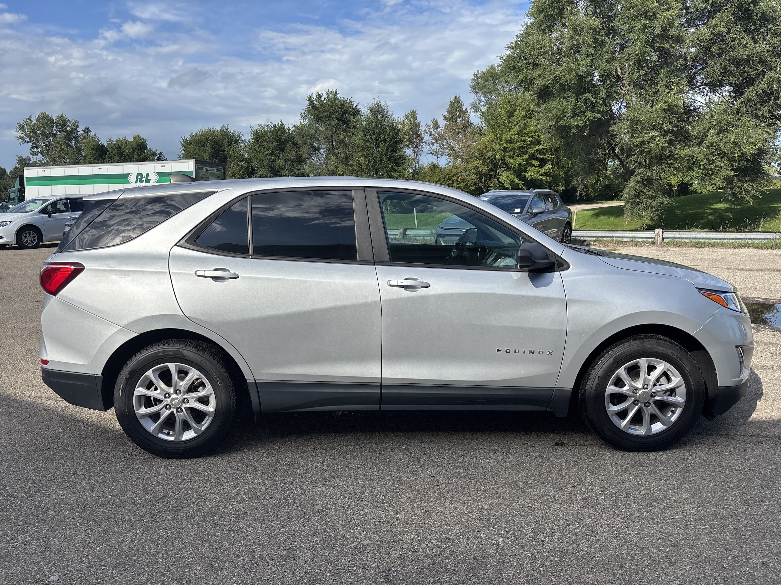 Used 2021 Chevrolet Equinox 1FL with VIN 3GNAXFEV8MS128449 for sale in Wayland, MI