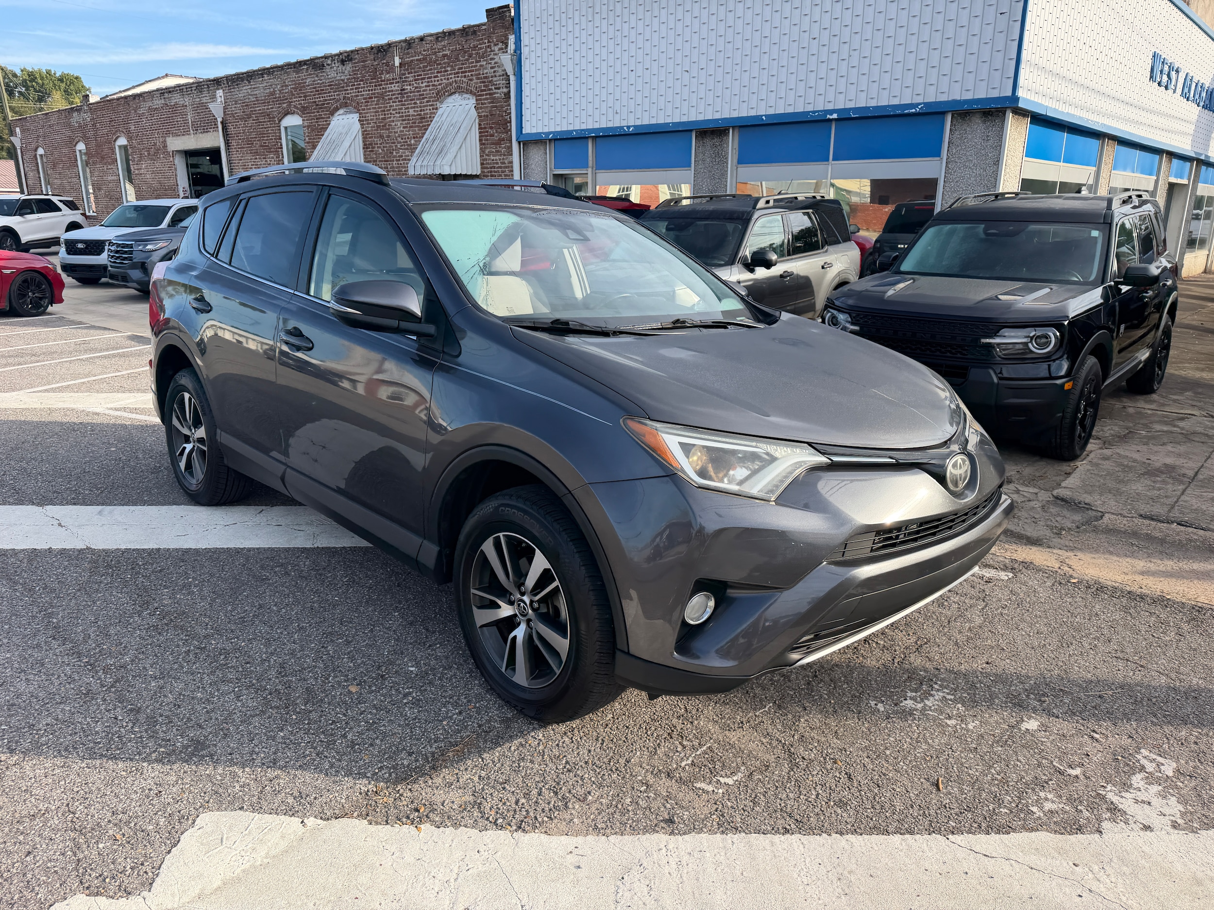 Used 2017 Toyota RAV4 XLE with VIN JTMWFREV7HJ708656 for sale in Sulligent, AL