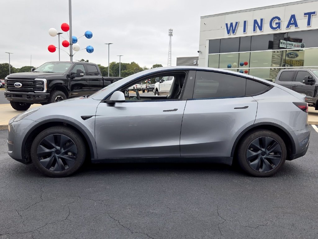 Used 2024 Tesla Model Y Long Range with VIN 7SAYGDED9RA327108 for sale in Perry, GA