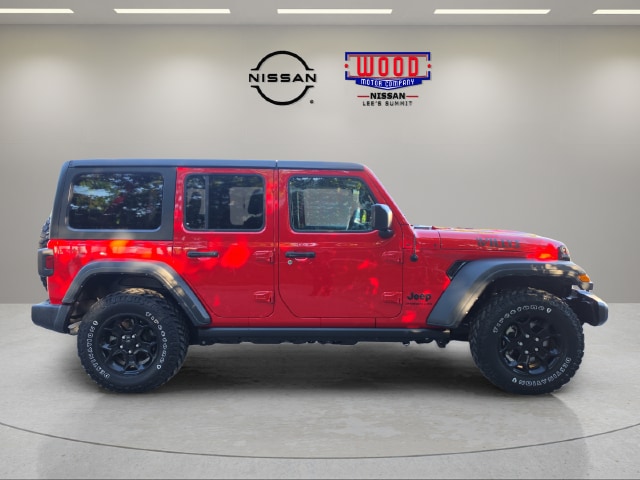 Used 2023 Jeep Wrangler 4-Door Willys with VIN 1C4HJXDG9PW656348 for sale in Kansas City